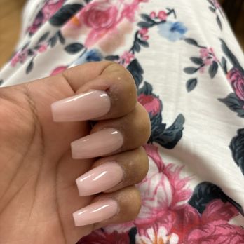 Luxury Nails - She cut my cuticle and it looks like there is a hole which there is because she went too deep horrible place ! - Nail Salons Near Me - Melrose Park, Illinois