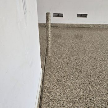 1 Day Epoxy - Garage floor epoxy, even the pole was treated. - Flooring Near Me