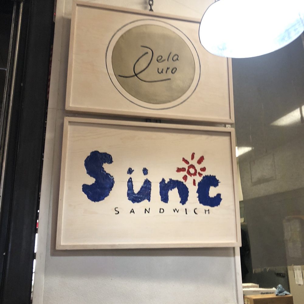 Dela Curo Curry - Signage above ordering station. - Sandwiches Near Me - Berkeley, California