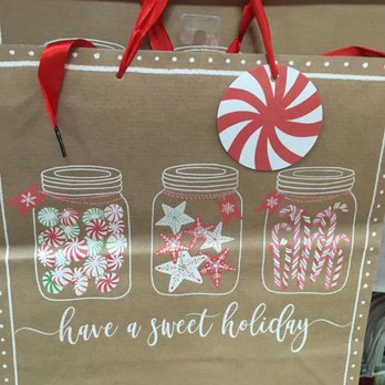 Dollar General - a brown gift bag with candy canes on it - Grocery Near Me - Mckinleyville, California
