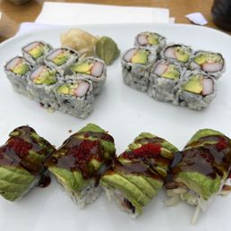 a plate of sushi rolls a plate of sushi rolls