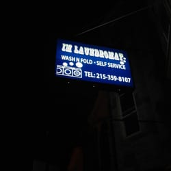 IM Laundromat - Sign outside.