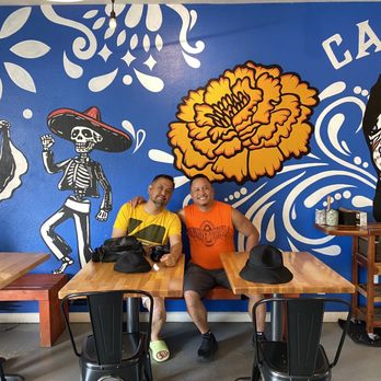 Cafeina Cafe - My hubby and our friend enjoying the fun decor. - Cafes Near Me - San Diego, California Cafeina Cafe - My hubby and our friend enjoying the fun decor. - Cafes Near Me - San Diego, California