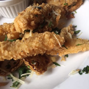 Summit Grill - Happy hour Calamari cut length wise into strips, as opposed to the rings which I prefer. Tender and crunchy, cooked properly! - Bars Near Me - Kansas City, Missouri
