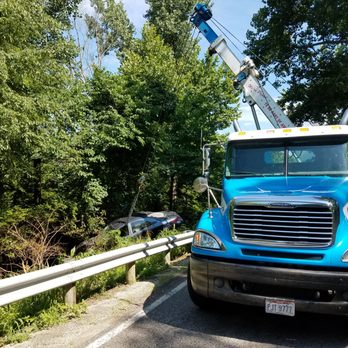 Wreckers Towing & Transport - Car over hillside. - Roadside Assistance Near Me - Sidney, Ohio Wreckers Towing & Transport - Car over hillside. - Roadside Assistance Near Me - Sidney, Ohio
