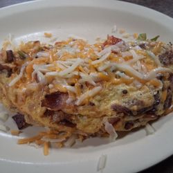 Sunshine Store & Cafe - Bacon and cheese omelet with peppers, onions and tomatoes.