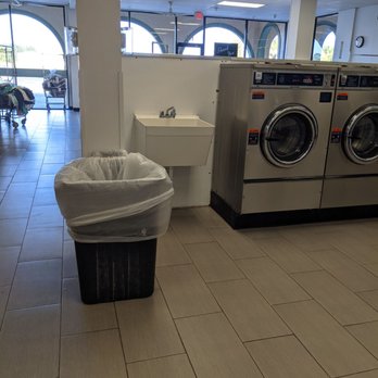 Clean Laundry of Melbourne - Laundry sink and garbage - Laundromat Near Me - Melbourne, Florida