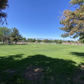 Pah Rah Mountain Park - Grassy area with the main playground in the background. - Parks Near Me - Sparks, Nevada Pah Rah Mountain Park - Grassy area with the main playground in the background. - Parks Near Me - Sparks, Nevada