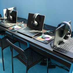 Empow Studios - Each child is given their own laptop and workspace to use.
