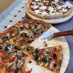 My Little Italy’s Pizza - Deluxe and margherita large pizzas Large Marguerita Pizza Deluxe Pizza