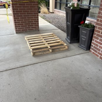 Hampton Inn Denver-Northwest/Westminster - Random pallet sitting at the front door - Hotels Near Me - Westminster, Colorado