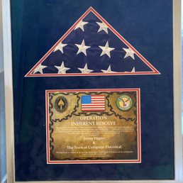 Framed American flag and certificate
