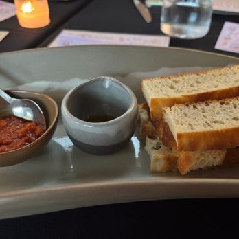 Blank Slate - Warm Prager Bread served with Basil Olive Oil, Sun Dried Tomato Tapenade - New American Near Me - Encinitas, California Blank Slate - Warm Prager Bread served with Basil Olive Oil, Sun Dried Tomato Tapenade - New American Near Me - Encinitas, California