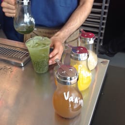 Different homemade soda syrups- vanilla, pineapple, ginger & spearmint.