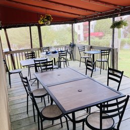 Outdoor seating in canopied deck. Outdoor seating in canopied deck.
