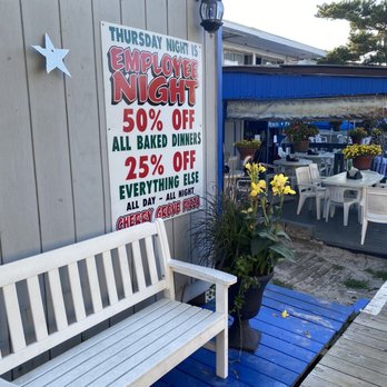 Cherry Grove Pizza - a white bench on a patio - Pizza Near Me - Fire Island, New York Cherry Grove Pizza - a white bench on a patio - Pizza Near Me - Fire Island, New York