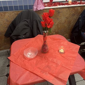 White Castle - Tables are decked out with red paper table clothes and fake flowers - Fast Food Near Me - Hasbrouck Hts., New Jersey