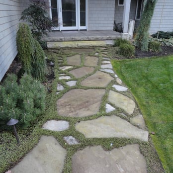Moore's Works - a stone path in front of a house - Landscaping Near Me - Indianola, Washington Moore's Works - a stone path in front of a house - Landscaping Near Me - Indianola, Washington