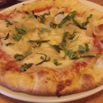 Dogfish Head Brewings & Eats - Red sauce, onions, basil pizza. Yuck. Horrible dough, glops of cheese, soggy onions. Barely 8 inches. - American Near Me - Rehoboth Beach, Delaware