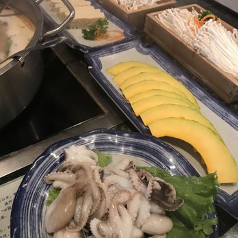 Happy Lamb Hot Pot - Octopus, pumpkin, frozen tofu, enoki mushrooms, thick noodles. - Mongolian Near Me - Mountain View, California