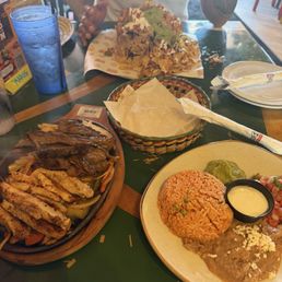 Fajitas chicken an steak , steak was a lil chewy chicken was better Fajitas chicken an steak , steak was a lil chewy chicken was better