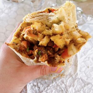 Photo of Lucha Libre Gourmet Taco Shop - San Diego, CA, United States. ADO-HABA PIÑA CALIFORNIA burrito