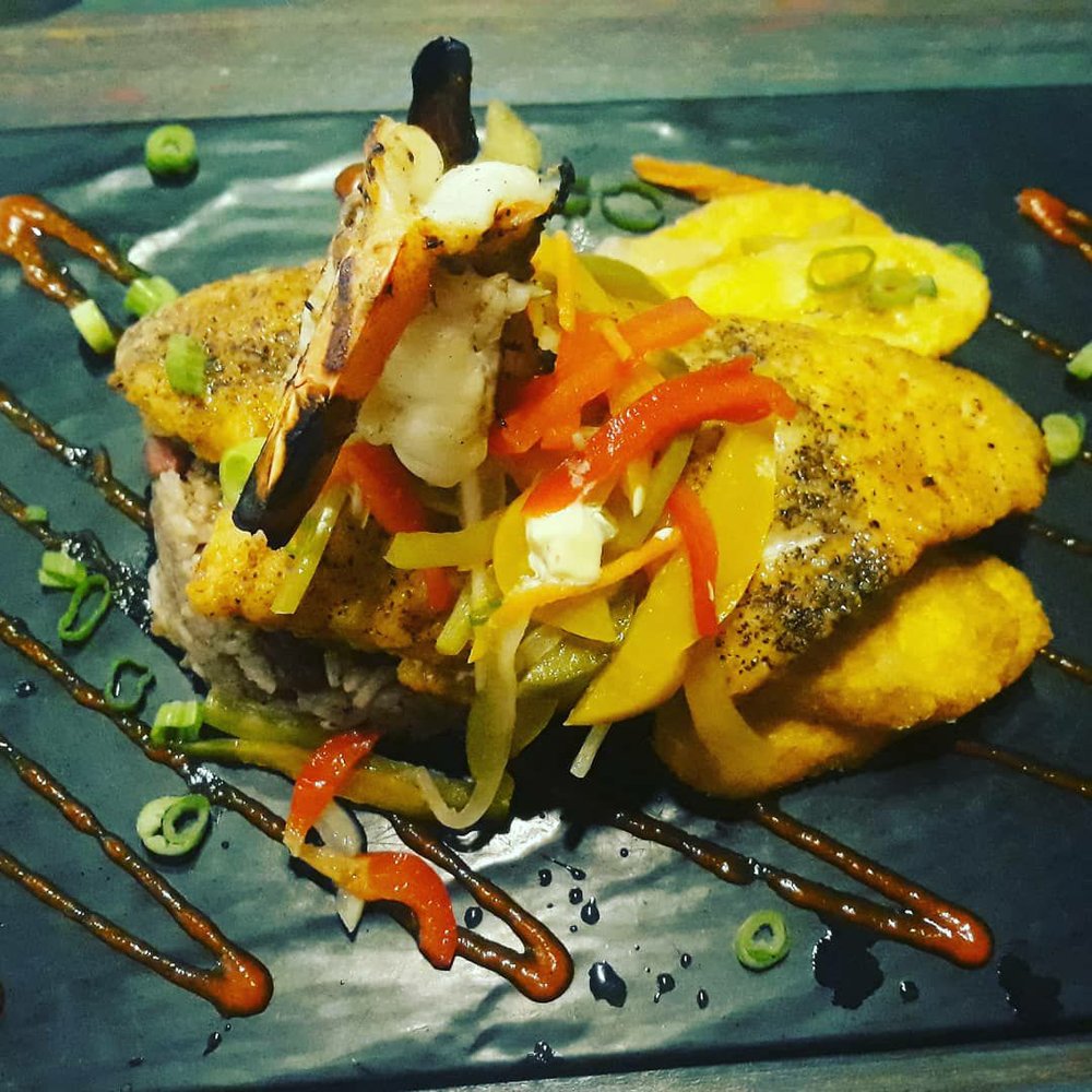 Sisserou's Caribbean Restaurant & Catering - Escovitch red snapper with fries plantains and Jamaican rice and peas. This dish was incredibly delicious!! - Caribbean Near Me - Tulsa, Oklahoma Sisserou's Caribbean Restaurant & Catering - Escovitch red snapper with fries plantains and Jamaican rice and peas. This dish was incredibly delicious!! - Caribbean Near Me - Tulsa, Oklahoma