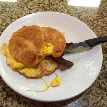 The Cracked Egg - Bacon, egg, and cheese on a croissant. - Breakfast & Brunch Near Me - Henderson, Nevada The Cracked Egg - Bacon, egg, and cheese on a croissant. - Breakfast & Brunch Near Me - Henderson, Nevada