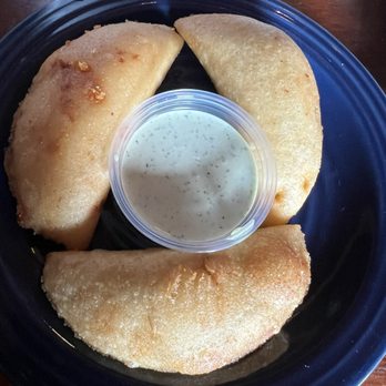 The Corner Pub - Trio of empanada for $4 1- beef 1-chicken 1-cheese - Pubs Near Me - Decatur, Georgia
