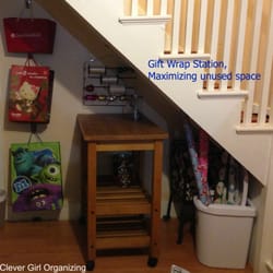 Clever Girl Organizing - Created a gift wrapping station in an underutilized space under a staircase.