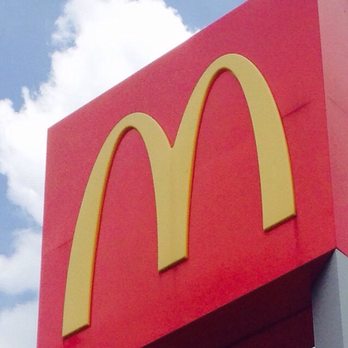 McDonald's - a mcdonald's sign in front of a cloudy blue sky - Fast Food Near Me - Columbus, Mississippi McDonald's - a mcdonald's sign in front of a cloudy blue sky - Fast Food Near Me - Columbus, Mississippi
