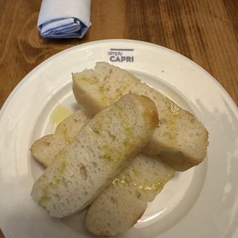 Simply Capri - Bread with oilive oil - Italian Near Me - Winter Garden, Florida Simply Capri - Bread with oilive oil - Italian Near Me - Winter Garden, Florida