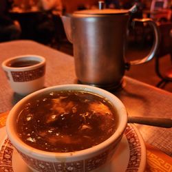 China Village - 1st course of the daily lunch special includes a cup of 1 of their 3 soups and pot of tea (chá). Hot & Sour (suān là tāng) is my fav soup