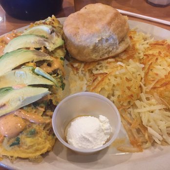 Cypress Breakfast House - The Mexican omelette. More Tex-Mex because of the queso and American Cheese. No Oaxaca cheese or cilantro. Still spicy and good. - Breakfast & Brunch Near Me - Cypress, Texas