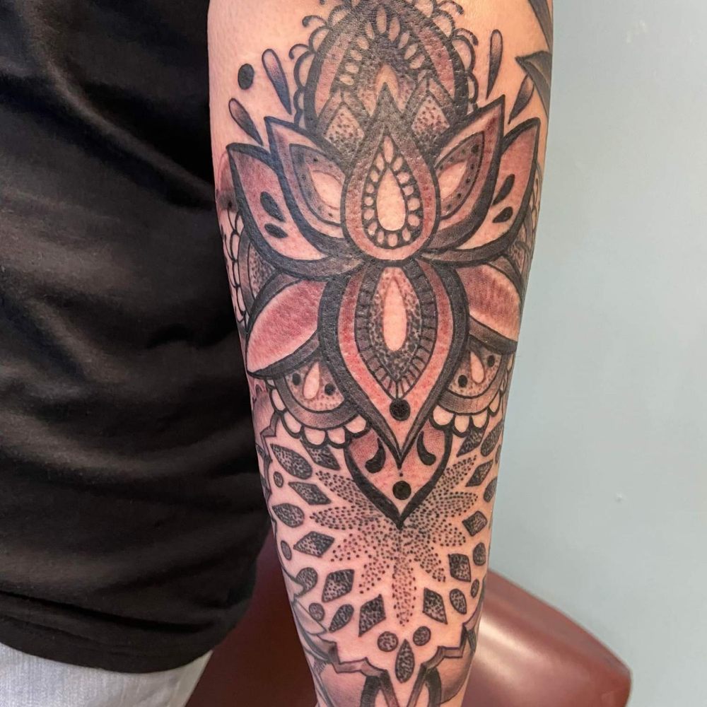 Anomaly Tattoo Studio - Full picture of lotus flower and mandala design. Backside of the half sleeve - Tattoo Near Me - Modesto, California Anomaly Tattoo Studio - Full picture of lotus flower and mandala design. Backside of the half sleeve - Tattoo Near Me - Modesto, California