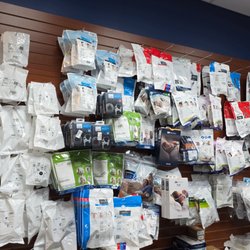 Binson's Medical Equipment and Supplies - Wall display at the Dearborn, MI location fully stocked with a wide variety of packaged CPAP masks and sleep therapy supplies.