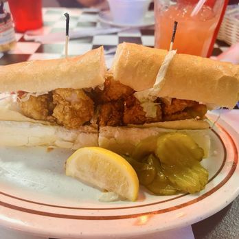 Acme Oyster House - Fried Soft Shell Crab Po-Boy - Seafood Near Me - New Orleans, Louisiana Acme Oyster House - Fried Soft Shell Crab Po-Boy - Seafood Near Me - New Orleans, Louisiana