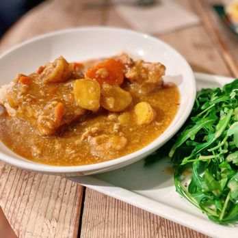 Bazaar Cafe - Curry & Biscuit $13.50 Makiko's Japanese Curry with a hint of South Africa &Ghost Pepper served on a biscuit w/ an arugula salad + Chicken. - Coffee & Tea Near Me - San Francisco, California Bazaar Cafe - Curry & Biscuit $13.50 Makiko's Japanese Curry with a hint of South Africa &Ghost Pepper served on a biscuit w/ an arugula salad + Chicken. - Coffee & Tea Near Me - San Francisco, California