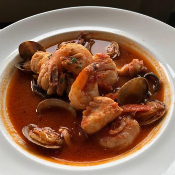 Moonraker Restaurant - Seafood cioppino with fish, shrimp, clams, tentacles of squid, scallops-yummy broth, squid ink linguine - New American Near Me - Pacifica, California Moonraker Restaurant - Seafood cioppino with fish, shrimp, clams, tentacles of squid, scallops-yummy broth, squid ink linguine - New American Near Me - Pacifica, California