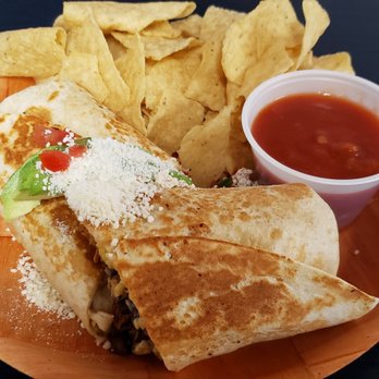 Chunky Salsa - Kitchen sink burrito with chicken - Latin American Near Me - Ocean Isle Beach, North Carolina