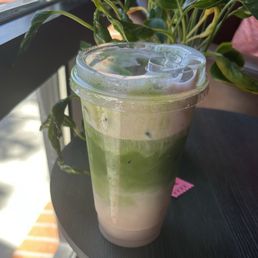Iced matcha almond milk latte w/cherry and cardamom cold foam Iced matcha almond milk latte w/cherry and cardamom cold foam