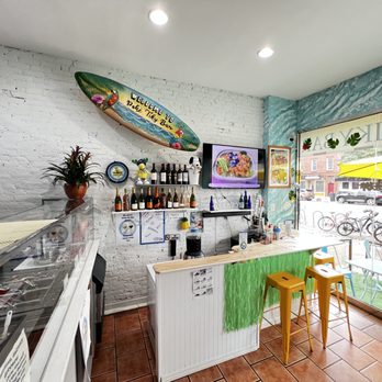 Poke Tiky Bar - a surfboard on the wall - Sushi Bars Near Me - Brooklyn, New York Poke Tiky Bar - a surfboard on the wall - Sushi Bars Near Me - Brooklyn, New York