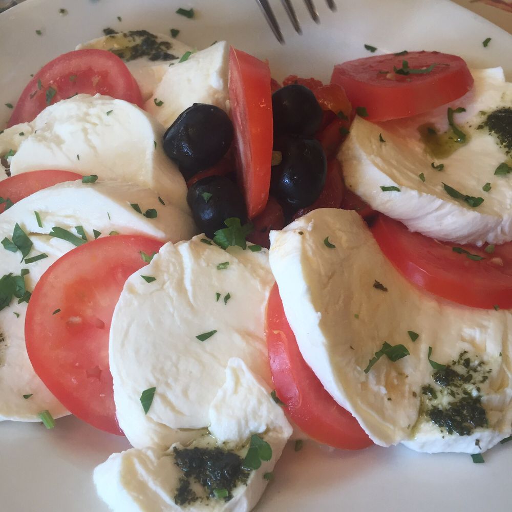 Margherita's - Mozzarella and tomatoes - Pizza Near Me - Hoboken, New Jersey Margherita's - Mozzarella and tomatoes - Pizza Near Me - Hoboken, New Jersey