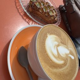 Spinach and cheese croissant and their maple lavender, latte Spinach and cheese croissant and their maple lavender, latte