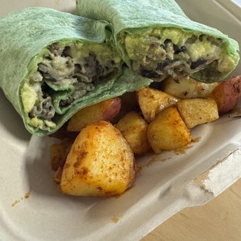 Petit Cafe - Breakfast wrap and potatoes. Do not recommend. - Coffee & Tea Near Me - Oakland, California