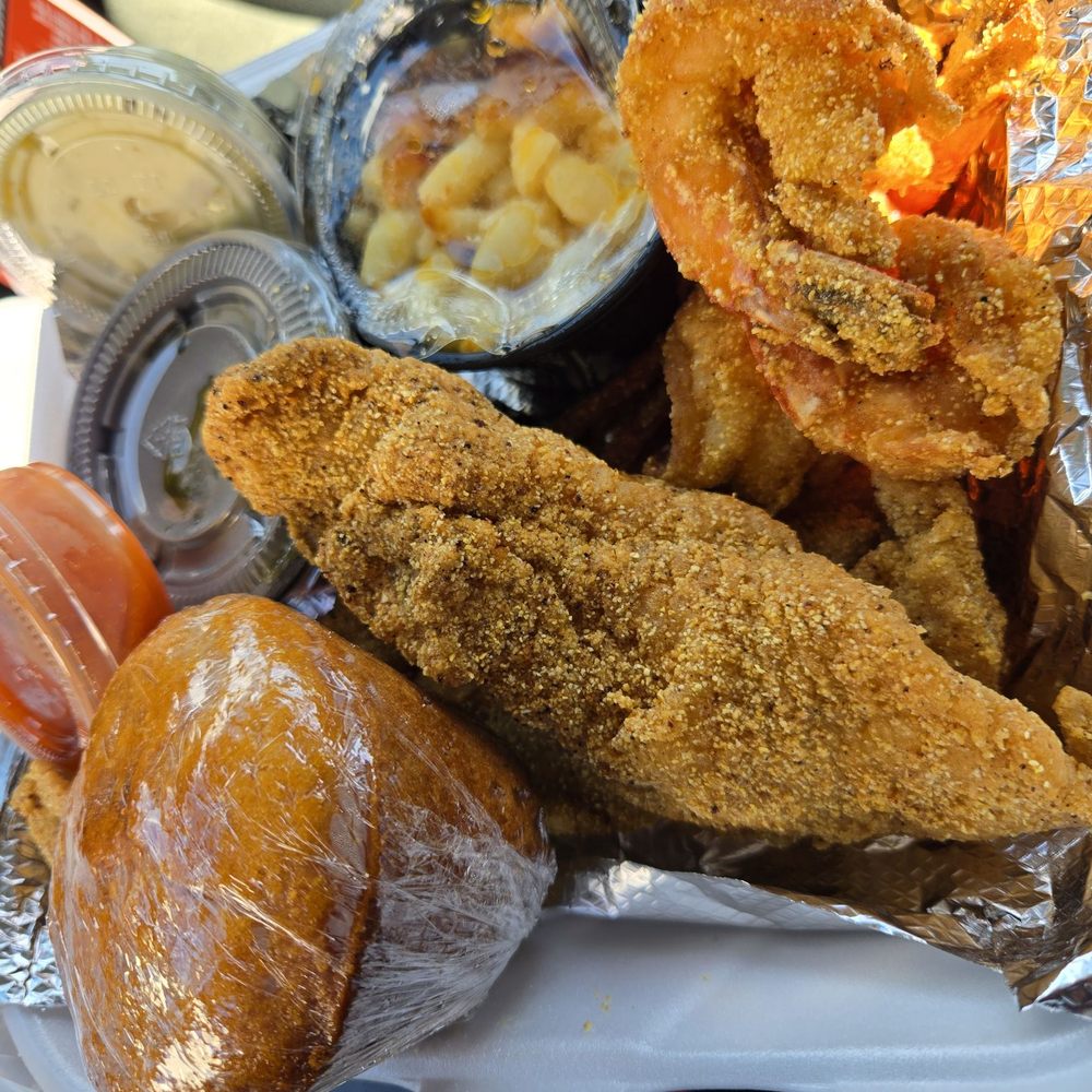 Compton’s Original Seafood and Chicken - Catfish & shrimp lunch plate. Extra cornbread muffin - Fish & Chips Near Me - Compton, California Compton’s Original Seafood and Chicken - Catfish & shrimp lunch plate. Extra cornbread muffin - Fish & Chips Near Me - Compton, California