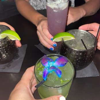 Sauce'd - 2 Moonshine Mules, Green Goddess and Lavender Moon - Cocktail Bars Near Me - Wilmington, North Carolina Sauce'd - 2 Moonshine Mules, Green Goddess and Lavender Moon - Cocktail Bars Near Me - Wilmington, North Carolina