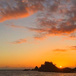Aloha Cottages - The sunrise at Hana Bay.. Just a walk down the street.