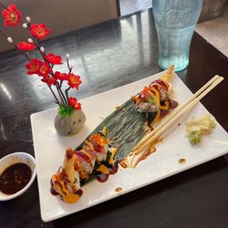 Oki Japan Sushi & Hibatchi Grill - Don't remember the name of the roll but the waitress recommended it