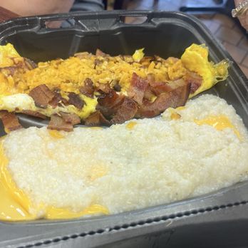 Big John’s Donuts -N- Deli - Omelette and cheese grits - Donuts Near Me - Kenner, Louisiana Big John’s Donuts -N- Deli - Omelette and cheese grits - Donuts Near Me - Kenner, Louisiana